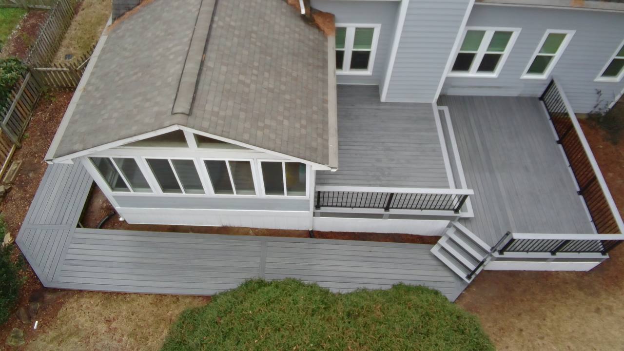 Premium custom composite deck and screened porch by Mission Decks & Design in Holly Springs NC