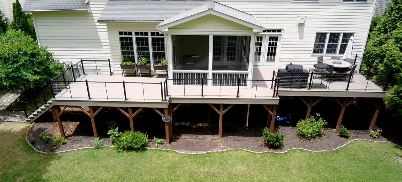 Aerial view of a Mission Decks composite deck and covered porch